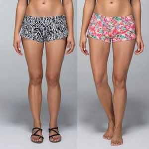 2 pairs LULULEMON Reversible Shanti Surf Shorts, size 6, Floral and Palm Print
